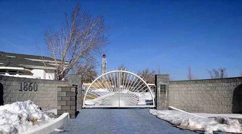 A white iron gate