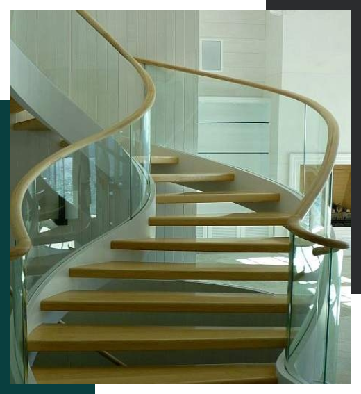 A staircase with a glass railing